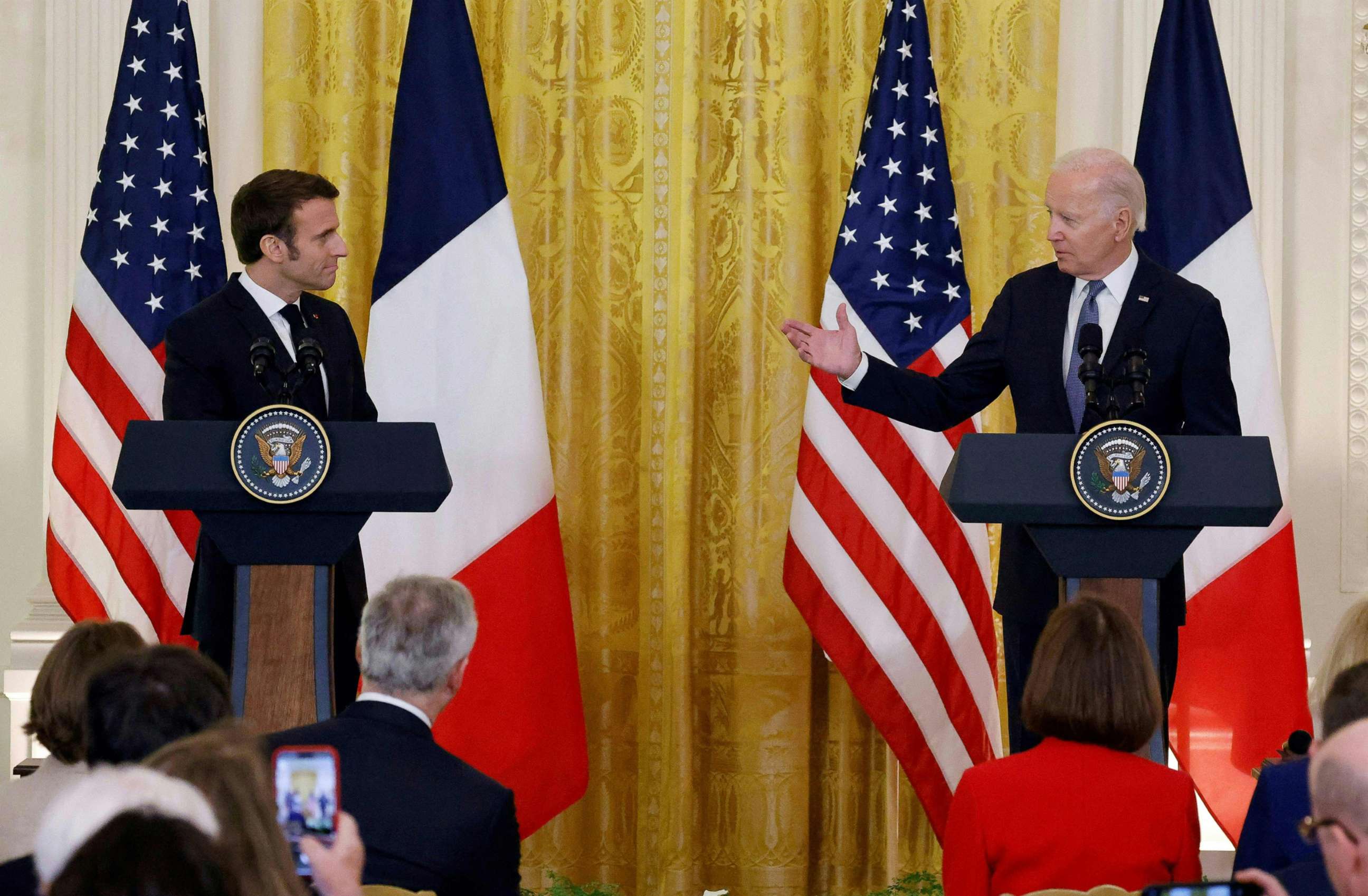 PHOTO: President Joe Biden speaks as French President Emmanuel Macron listens during a joint press conference in the East Room of the White House, Dec. 1, 2022. 