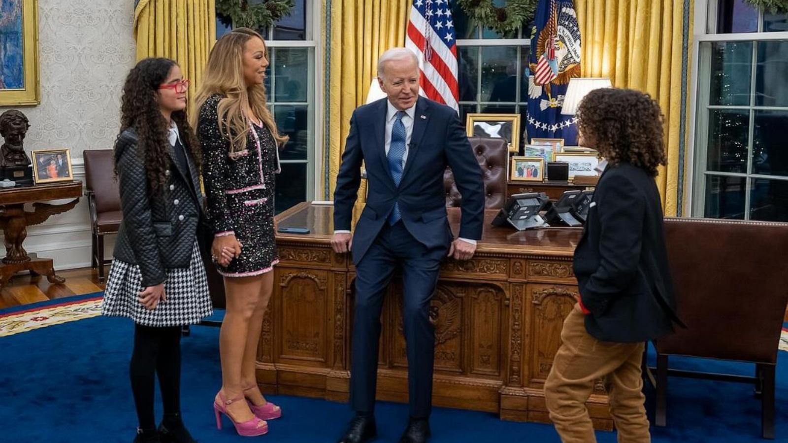 PHOTO: President Joe Biden speaks with Mariah Carey, her daughter Monroe and her son Moroccan, in the Oval Office of the White House, in Washington, D.C.,