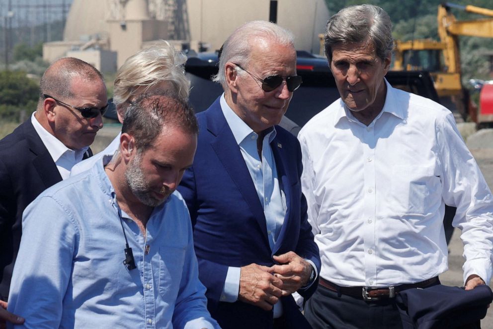 PHOTO: President Joe Biden, with U.S. Special Presidential Envoy for Climate John Kerry, arrives to deliver remarks on climate change and renewable energy at the site of the former Brayton Point Power Station in Somerset, Mass., July 20, 2022.
