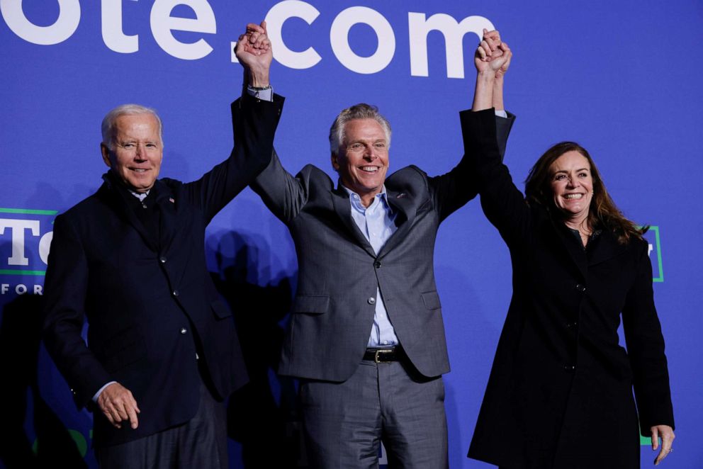 PHOTO: Democratic candidate for governor of Virginia Terry McAuliffe reacts between his wife Dorothy and President Joe Biden at a rally in Arlington, Va., Oct. 26, 2021.