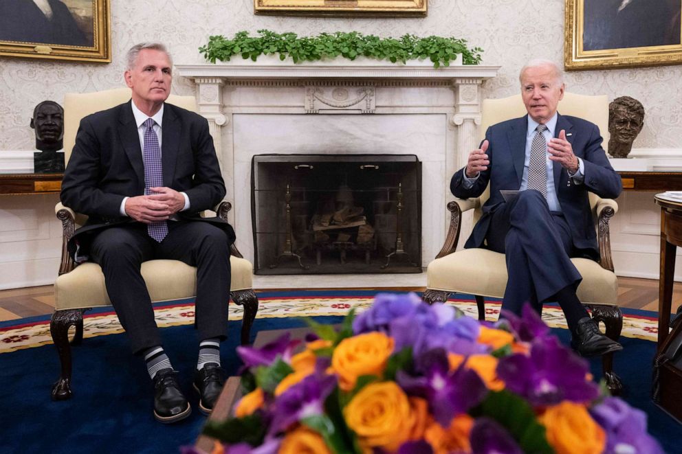 PHOTO: House Speaker Kevin McCarthy looks on as President Joe Biden speaks during a meeting on the debt ceiling, in the Oval Office of the White House in Washington, on May 22, 2023.