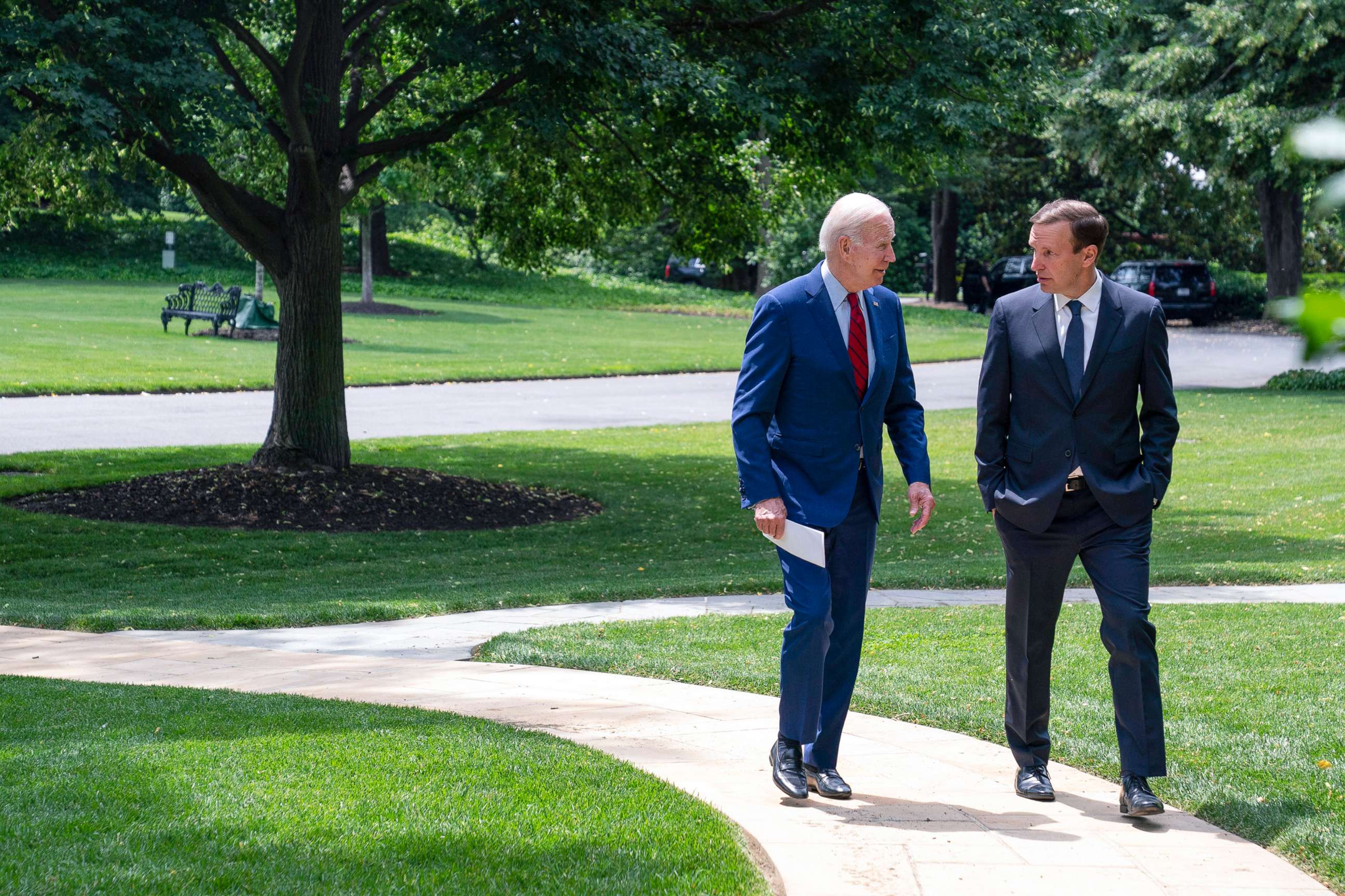 PHOTO: President Joe Biden talks with Sen. Chris Murphy as they walk to a meeting about gun control outside the Oval Office of the White House, June 7, 2022, in Washington.