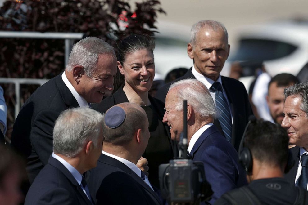 PICTURED: President Joe Biden is greeted by former Israeli Prime Minister and opposition leader Benjamin Netanyahu upon his arrival at Ben Gurion Airport, in Lod, near Tel Aviv, Israel, July 13, 2022.  