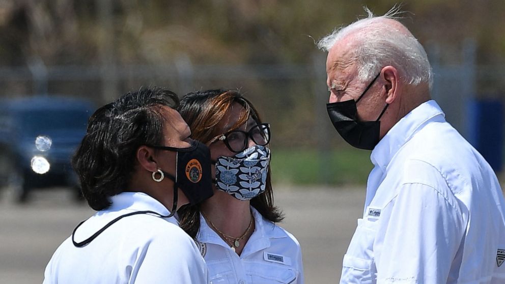 PHOTO: President Joe Biden speaks with New Orleans Mayor LaToya Cantrell, left, and Jefferson Parish President Cynthia Lee Sheng upon arrival at Louis Armstrong New Orleans International Airport in Kenner, LA. on Sept. 3, 2021.