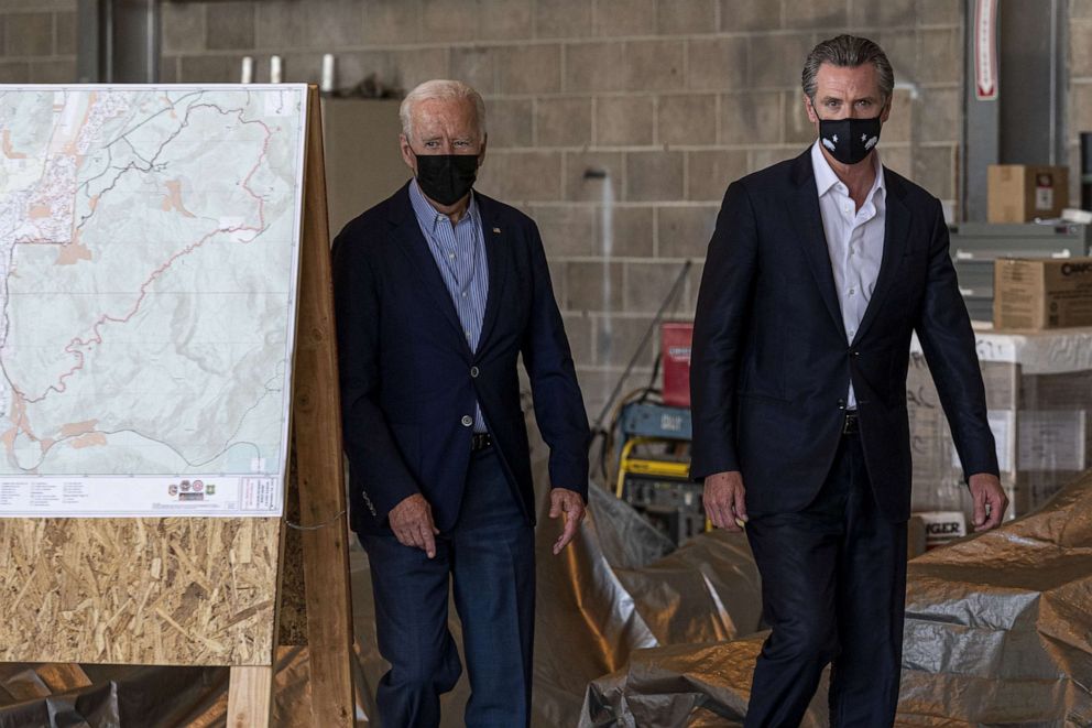 PHOTO: President Joe Biden, left and Gavin Newsom, governor of California, arrive to a news conference at Sacramento Mather Airport in Mather, Calif., Sept. 13, 2021.