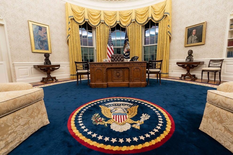 PHOTO: The Oval Office of the White House is newly redecorated for the first day of President Joe Biden's administration, Jan. 20, 2021, in Washington. New carpeting and drapes are some of the pictured changes.