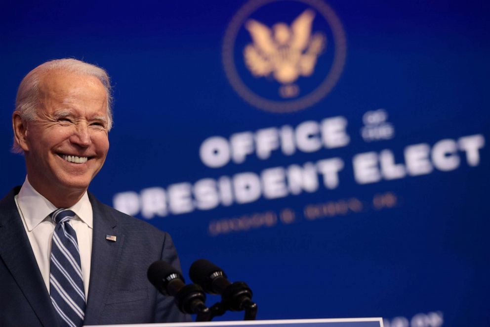 PHOTO: President-elect Joe Biden smiles as he speaks about health care and the Affordable Care Act at the theater serving as his transition headquarters in Wilmington, Del., Nov. 10, 2020.