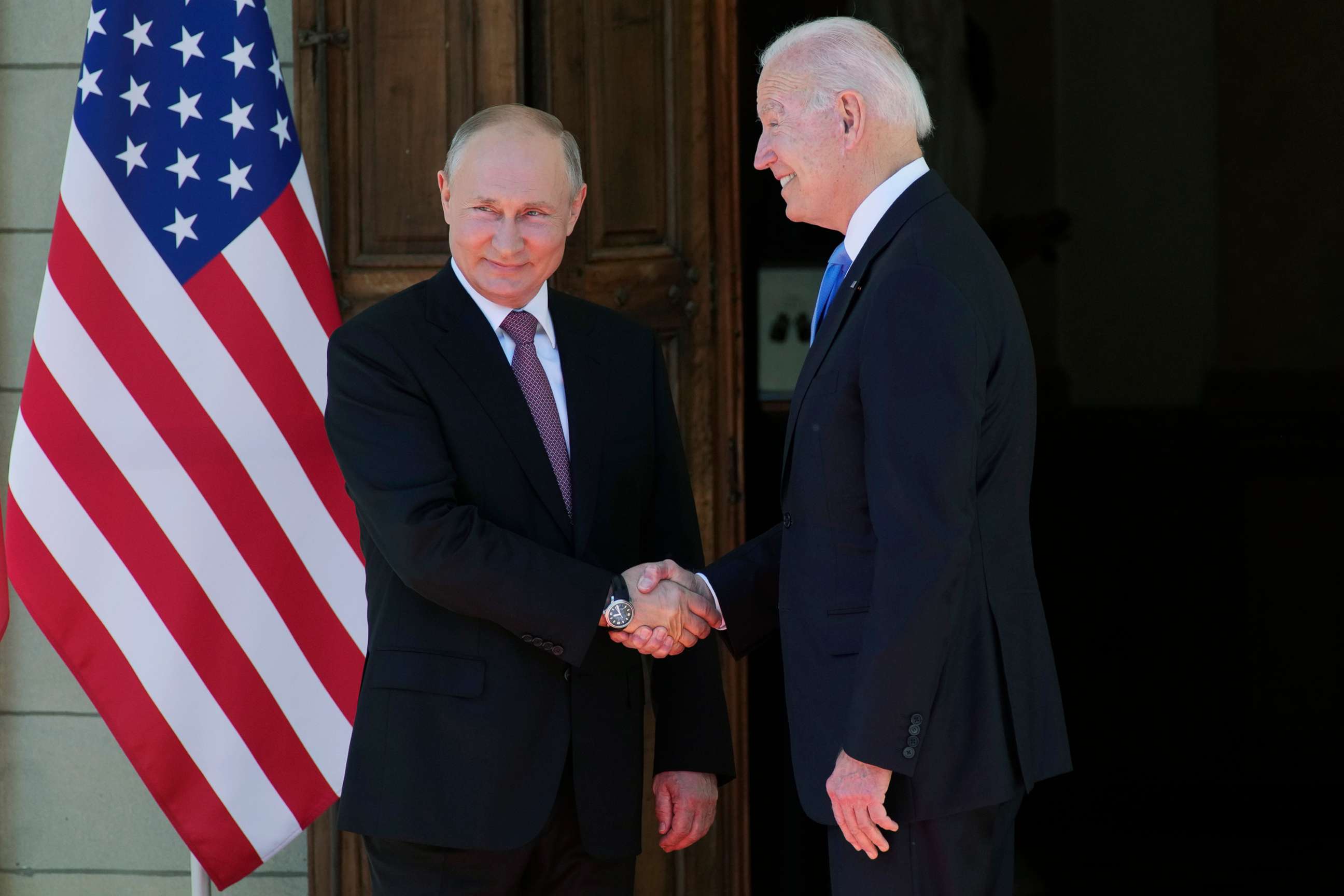 PHOTO: Russian President Vladimir Putin, left, and U.S President Joe Biden shake hands during their meeting at the 'Villa la Grange' in Geneva, Switzerland in Geneva, June 16, 2021. 