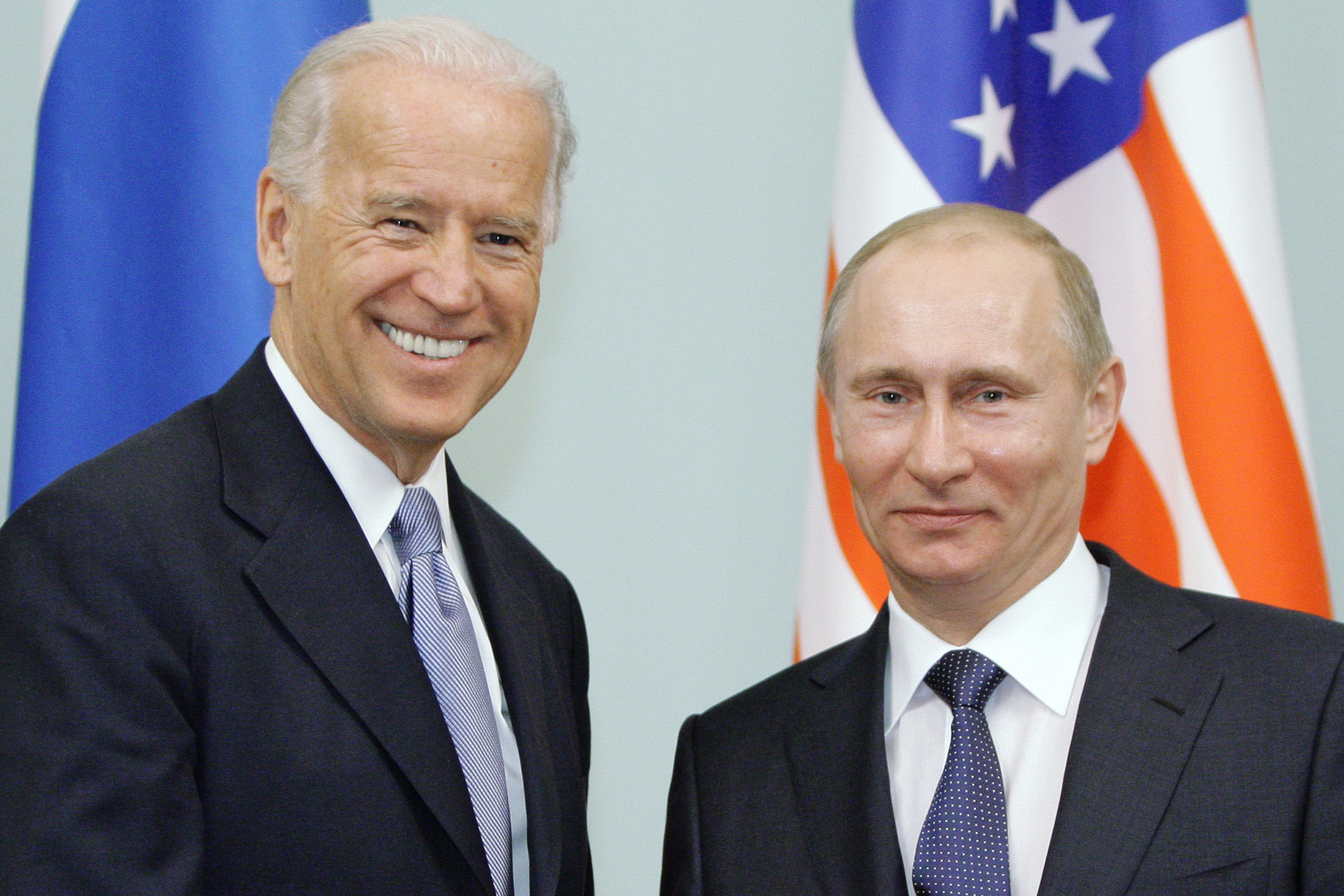 PHOTO: Then Vice President Joe Biden, left, shakes hands with Russian Prime Minister Vladimir Putin in Moscow, Russia, March 10, 2011.