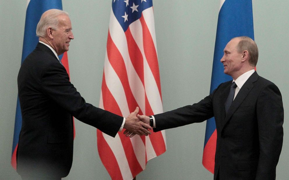 PHOTO: Then-Russian Prime Minister Vladimir Putin shakes hands with then-Vice President Joe Biden during their meeting in Moscow, March 10, 2011.