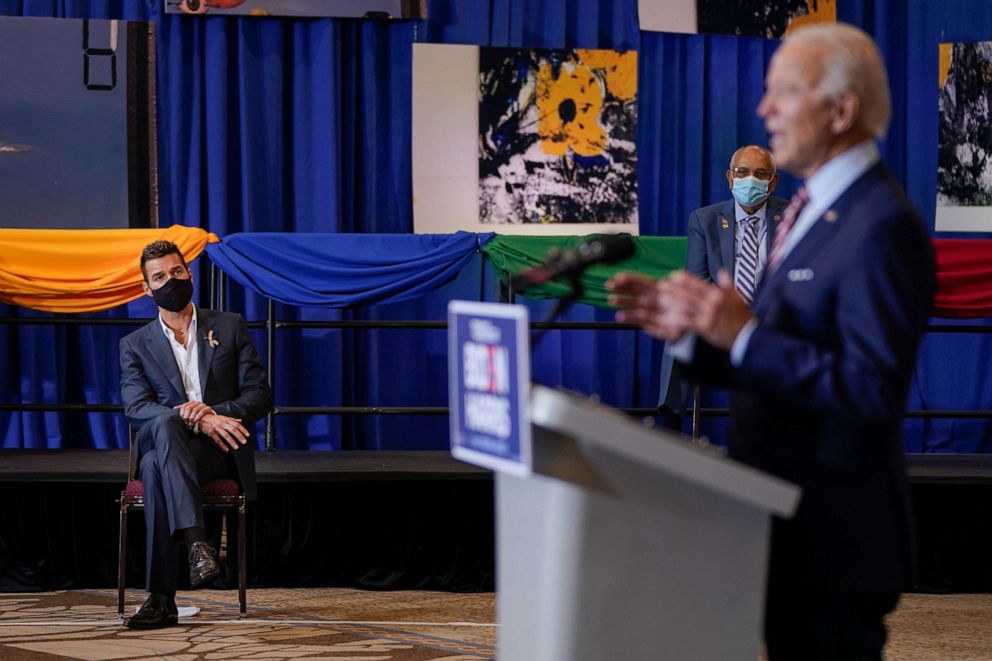 PHOTO: Puerto Rican singer Ricky Martin looks on as Democratic presidential nominee and former Vice President Joe Biden speaks at a Hispanic heritage event at Osceola Heritage Park on Sept. 15, 2020, in Kissimmee, Fla.