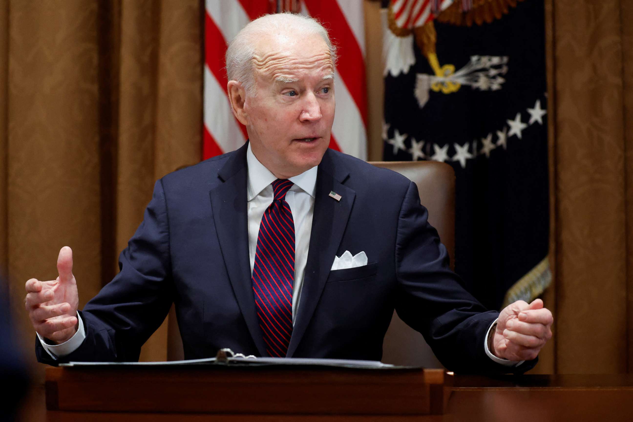 PHOTO: President Joe Biden gestures during a meeting with his Infrastructure Implementation Task Force in the Cabinet Room at the White House in Washington, D.C., Jan. 20, 2022.
