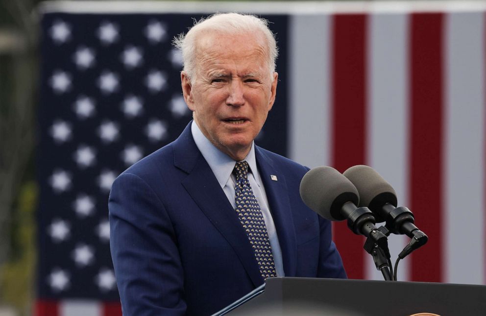 PHOTO: President Joe Biden speaks at a drive-in car rally to celebrate the president's 100th day in office at the Infinite Energy Center in Duluth, Georgia, April 29, 2021.