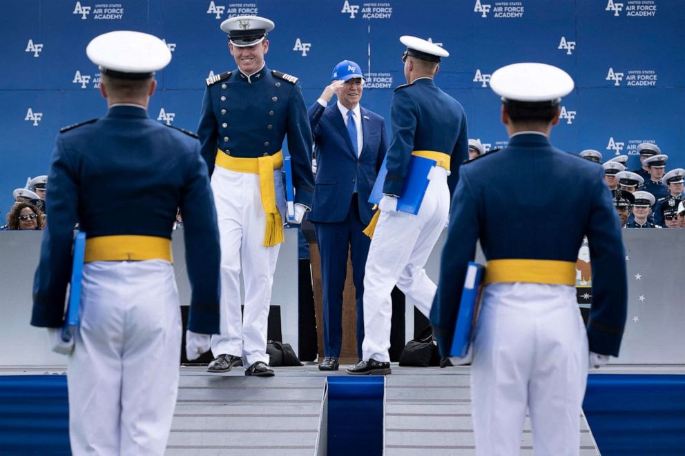 PHOTO: President Joe Biden salutes graduating cadets during the commencement ceremony at the United States Air Force Academy, north of Colorado Springs in El Paso County, Colorado, June 1, 2023.