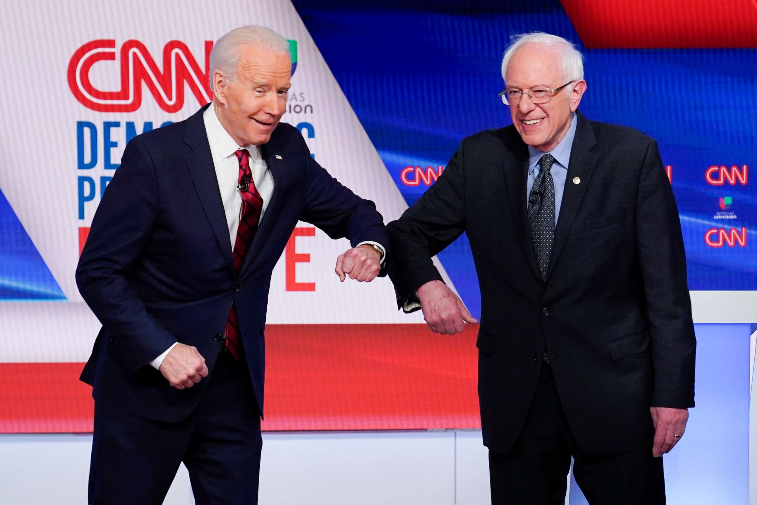 PHOTO: Former Vice President Joe Biden, left, and Sen. Bernie Sanders greet each other before they participate in a Democratic presidential primary debate at CNN Studios in Washington, March 15, 2020.