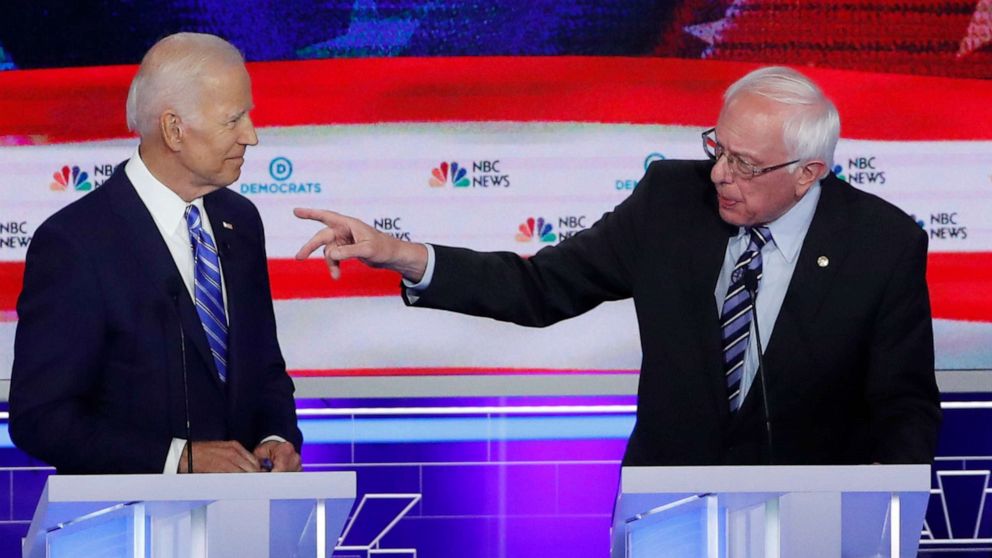 PHOTO: Joe Biden and Bernie Sanders participate in the second night of the first 2020 democratic presidential debate at the Adrienne Arsht Center for the Performing Arts in Miami, June 27, 2019.