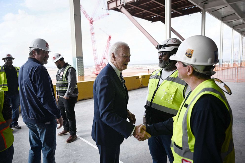 PHOTO: President Joe Biden greets workers as he tours the TSMC Semiconductor Manufacturing Facility in Phoenix, Ariz., Dec. 6, 2022.
