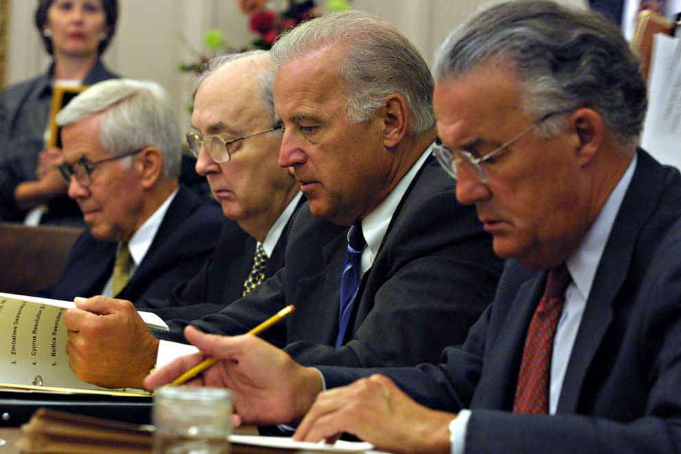 PHOTO: Members of Senate Foreign Relations Committee, from left, GOP Senators Richard G. and Jesse Helms, Democratic Senators Joseph Biden and Paul Sarbanes read papers July 12, 2001, during a Senate Foreign Relations Committee meeting in Washington.