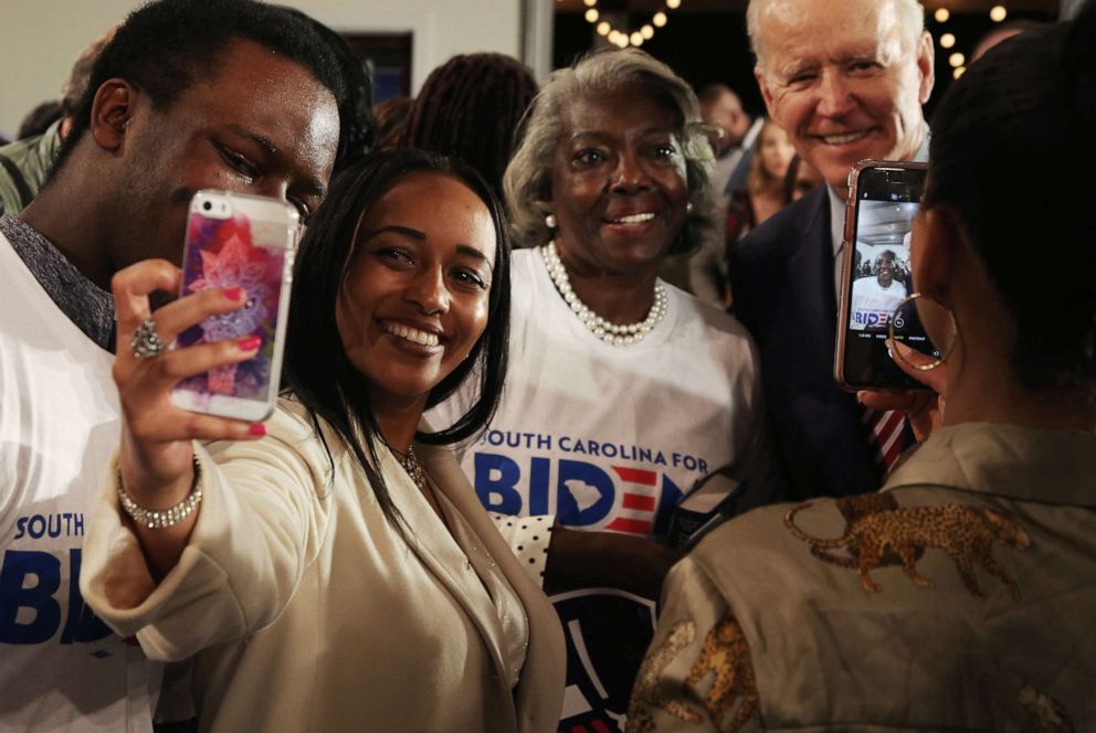 PHOTO: Supporters take selfies with Democratic presidential candidate and former Vice President Joe Biden at a campaign event in Columbia, S.C. on Feb. 11, 2020.