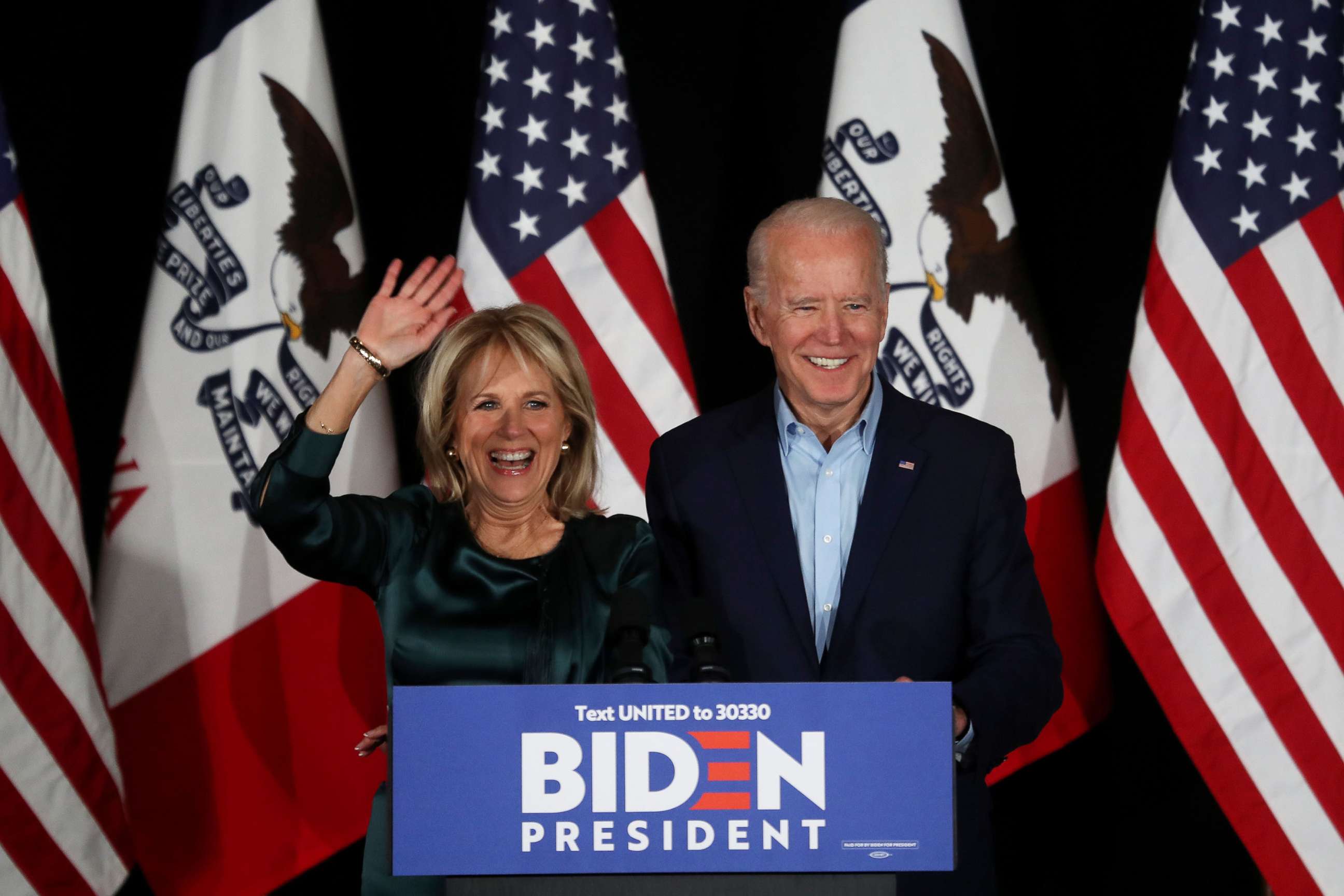 PHOTO: Democratic presidential candidate former Vice President Joe Biden addresses supporters with his wife Dr. Jill Biden during his caucus night watch party on Feb. 03, 2020, in Des Moines, Iowa.