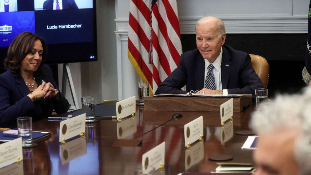 PHOTO: President Joe Biden is flanked by Vice President Kamala Harris as he speaks with members of his "Investing in America Cabinet" in the Roosevelt Room at the White House in Washington, May 5, 2023.