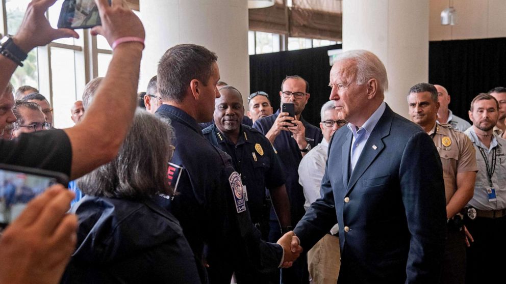 PHOTO: President Joe Biden greets first responders to the collapse of the Champlain Towers South condo building in Surfside, during a meeting with them in Miami Beach, Florida, July 1, 2021.