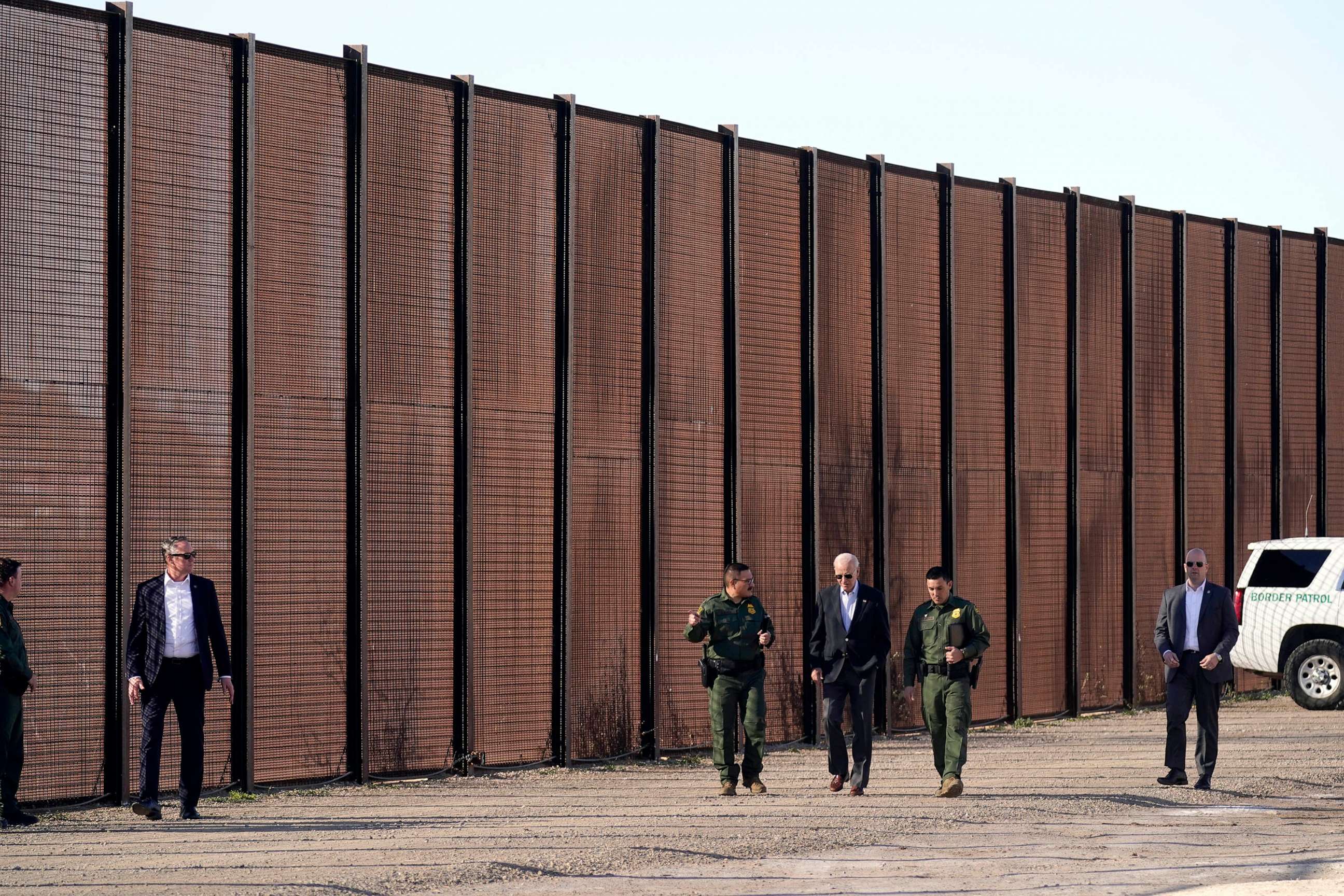 PHOTO: President Joe Biden walks with U.S. Border Patrol agents along a stretch of the U.S.-Mexico border in El Paso Texas, Jan. 8, 2023.