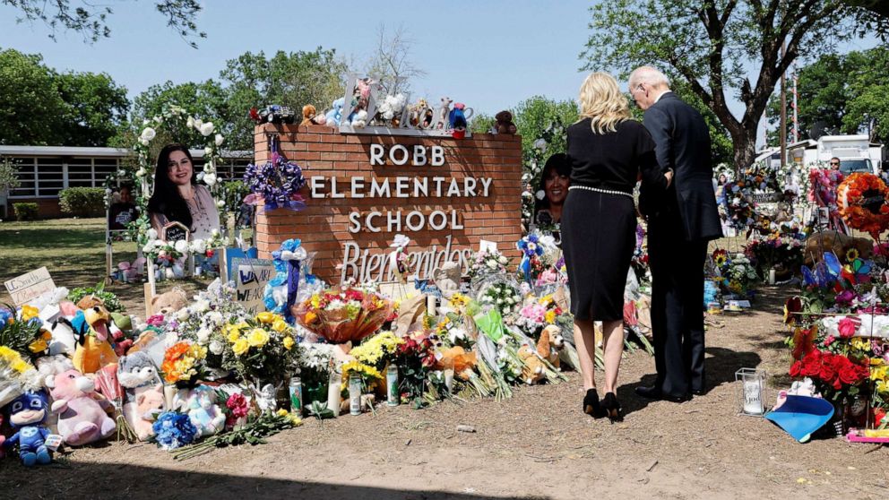 PHOTO: President Joe Biden and first lady Jill Biden pay their respects at the Robb Elementary School memorial, where a gunman killed 19 children and two teachers in the deadliest U.S. school shooting in nearly a decade, in Uvalde, Texas, May 29, 2022.