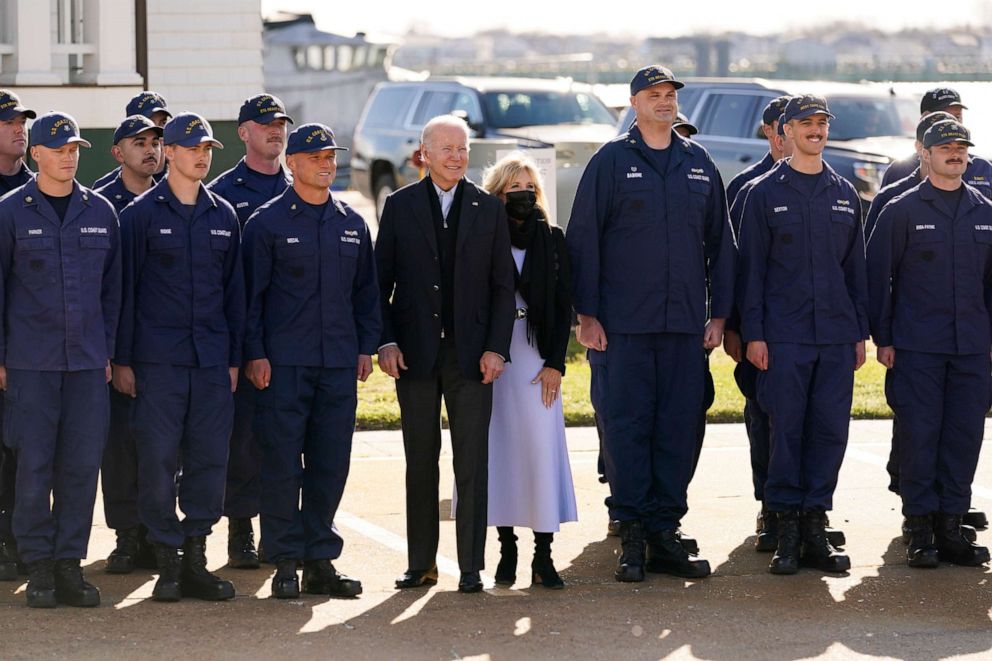 PHOTO: President Joe Biden and first lady Jill Biden pose for a photo with members of the coast guard at the United States Coast Guard Station Brant Point in Nantucket, Mass., Nov. 25, 2021.