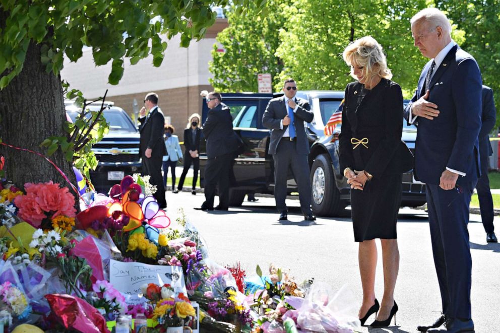 PHOTO: President Joe Biden and first lady Jill Biden visit a memorial near a Tops supermarket in Buffalo, New York, after the May 14 mass shooting at the store on May 17, 2022.