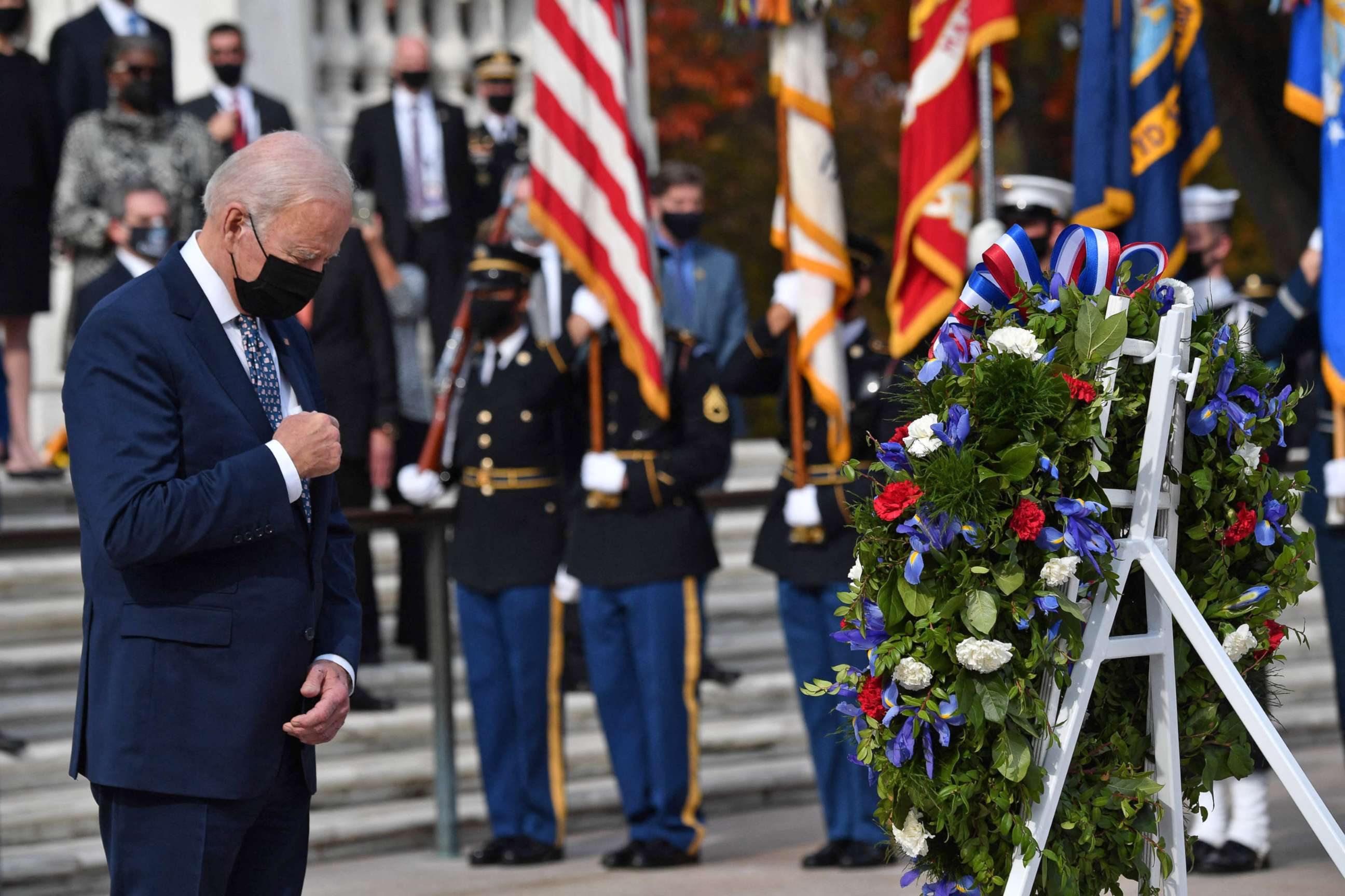 PHOTO: President Joe Biden bows his head during a wreath laying ceremony at The Tomb of the Unknown Soldier to commemorate Veterans Day at Arlington National Cemetery in Arlington, Va., Nov. 11, 2021.