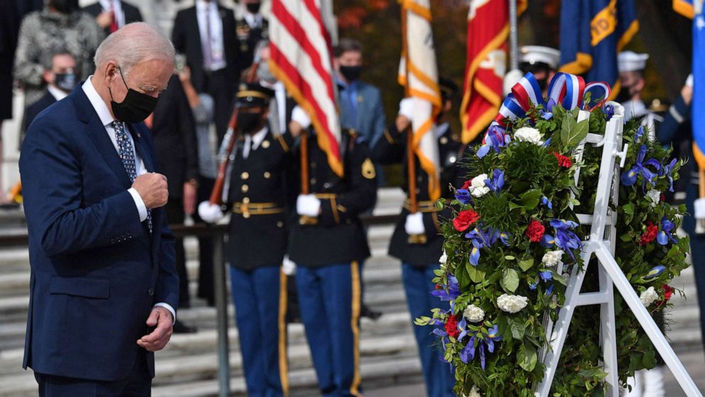 PHOTO: President Joe Biden bows his head during a wreath laying ceremony at The Tomb of the Unknown Soldier to commemorate Veterans Day at Arlington National Cemetery in Arlington, Va., Nov. 11, 2021.