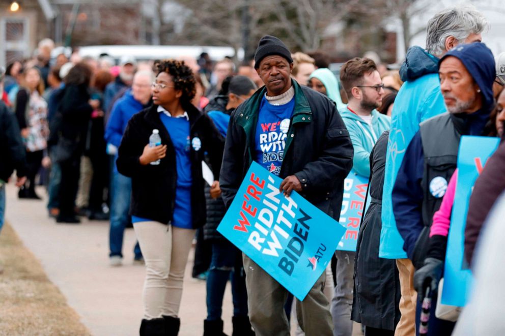 PHOTO: In this file photo taken on March 9, 2020, supporters line up to see Democratic presidential candidate Joe Biden speak at a campaign stop at Renaissance High School in Detroit.