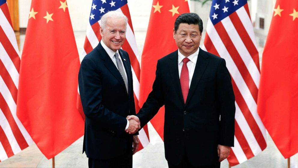 PHOTO: Chinese President Xi Jinping shakes hands with Vice President Joe Biden, left, inside the Great Hall of the People on Dec. 4, 2013, in Beijing.