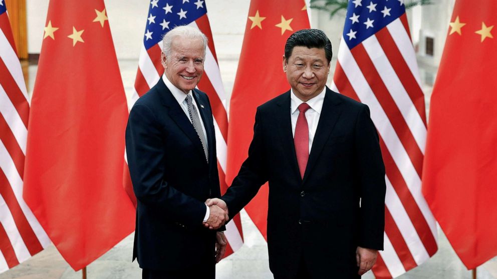 PHOTO: Chinese President Xi Jinping shakes hands with then Vice President Joe Biden, inside the Great Hall of the People in Beijing, Dec. 4, 2013.