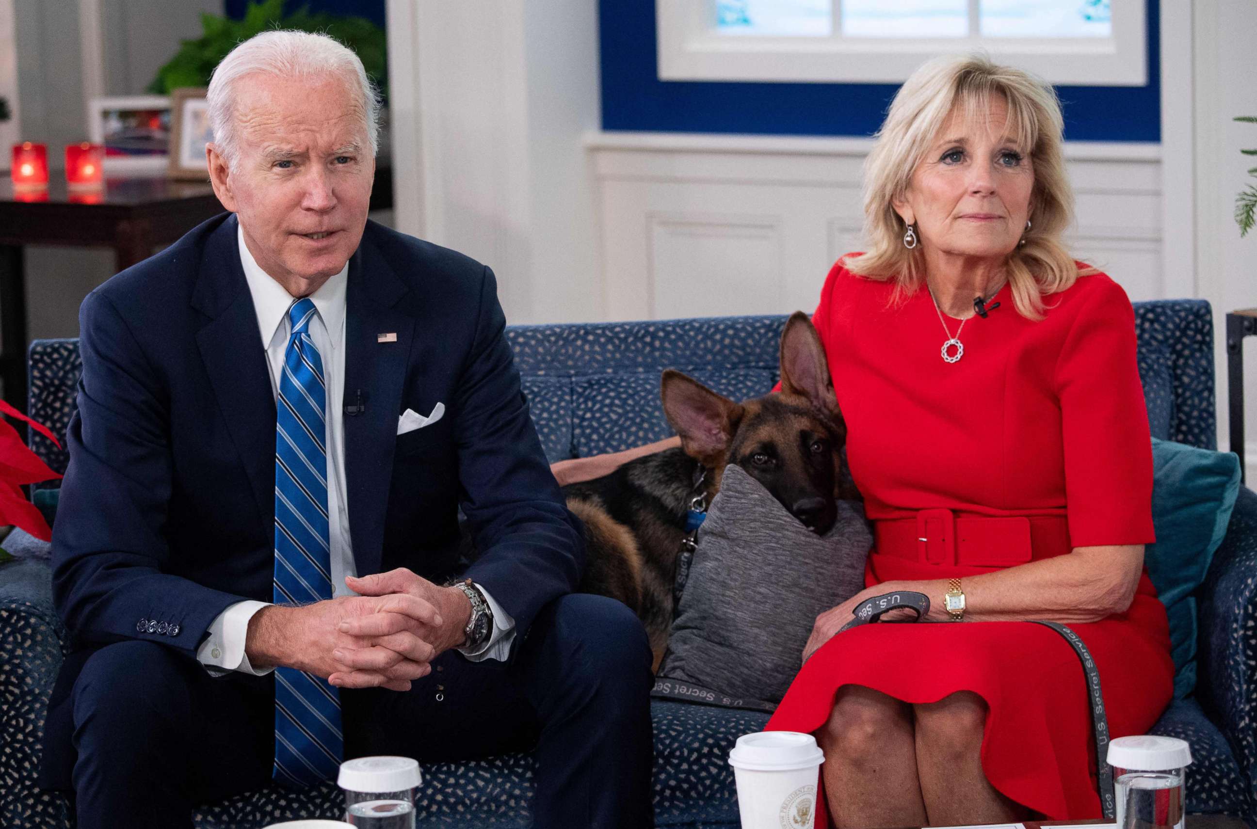 PHOTO: President Joe Biden and First Lady Jill Biden, with their new dog Commander, speak virtually with military service members to thank them for their service and wish then a Merry Christmas, Dec. 25, 2021.