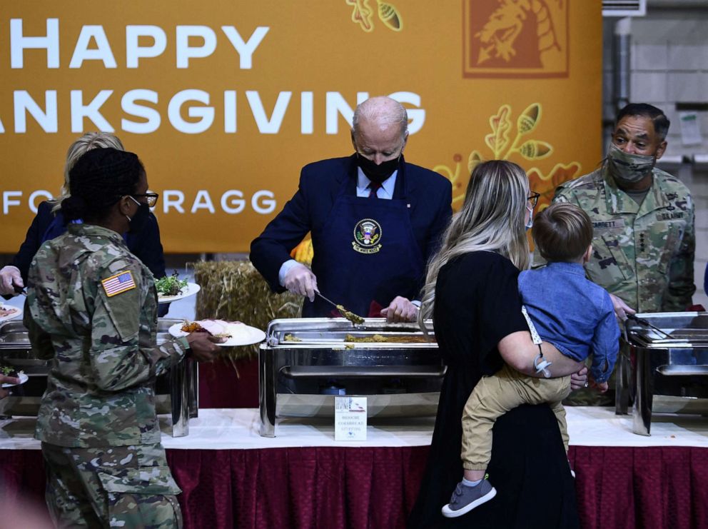 PHOTO: President Joe Biden serves food to soldiers at Fort Bragg to mark the upcoming Thanksgiving holiday, Nov. 22, 2021, in Fort Bragg, N.C. 