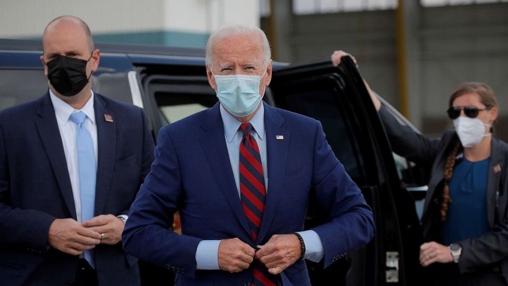 PHOTO: Democratic presidential candidate Joe Biden boards his campaign plane for travel to Miami at New Castle Airport in New Castle, Del., Oct. 6, 2020.