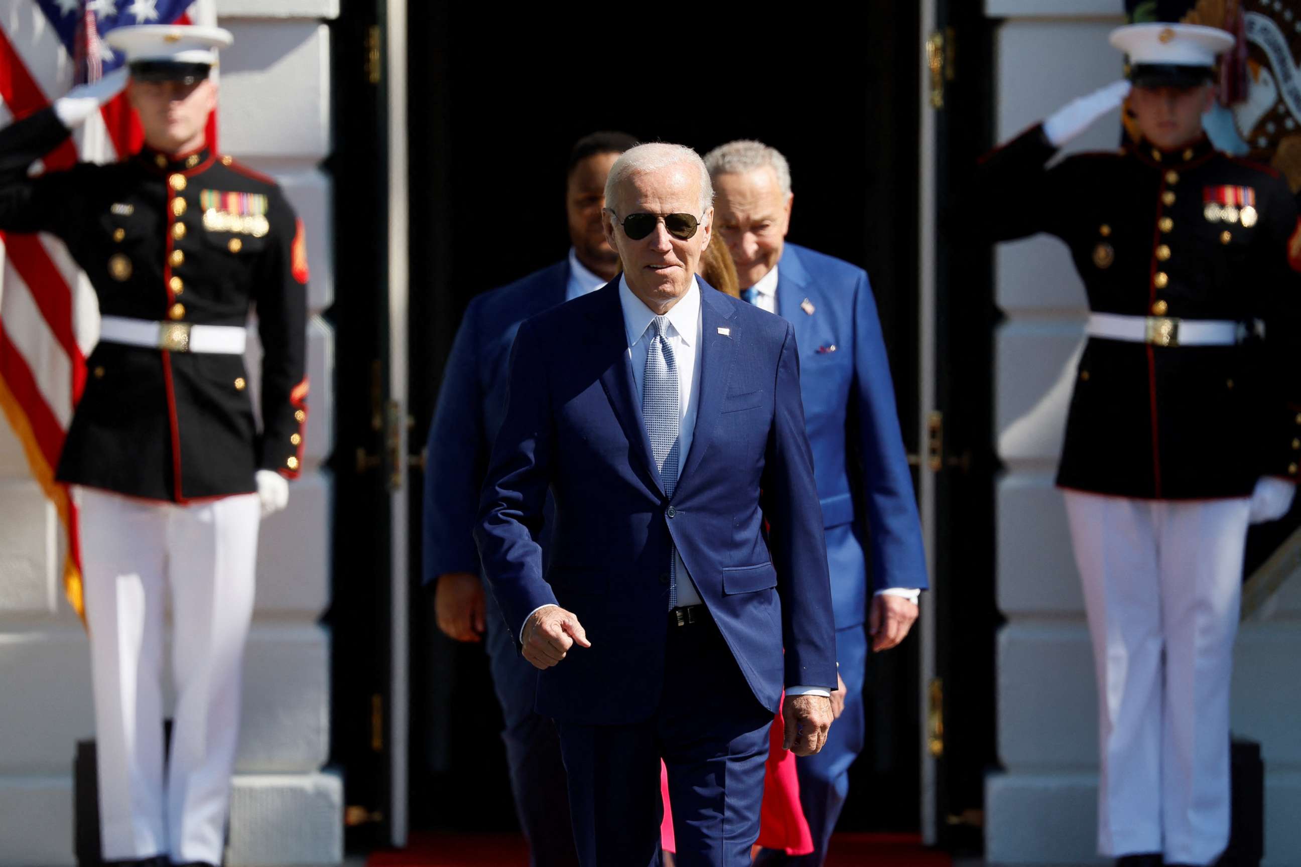 PHOTO: President Joe Biden walks to deliver remarks and sign the CHIPS and Science Act of 2022, on the South Lawn of the White House in Washington, Aug. 9, 2022.