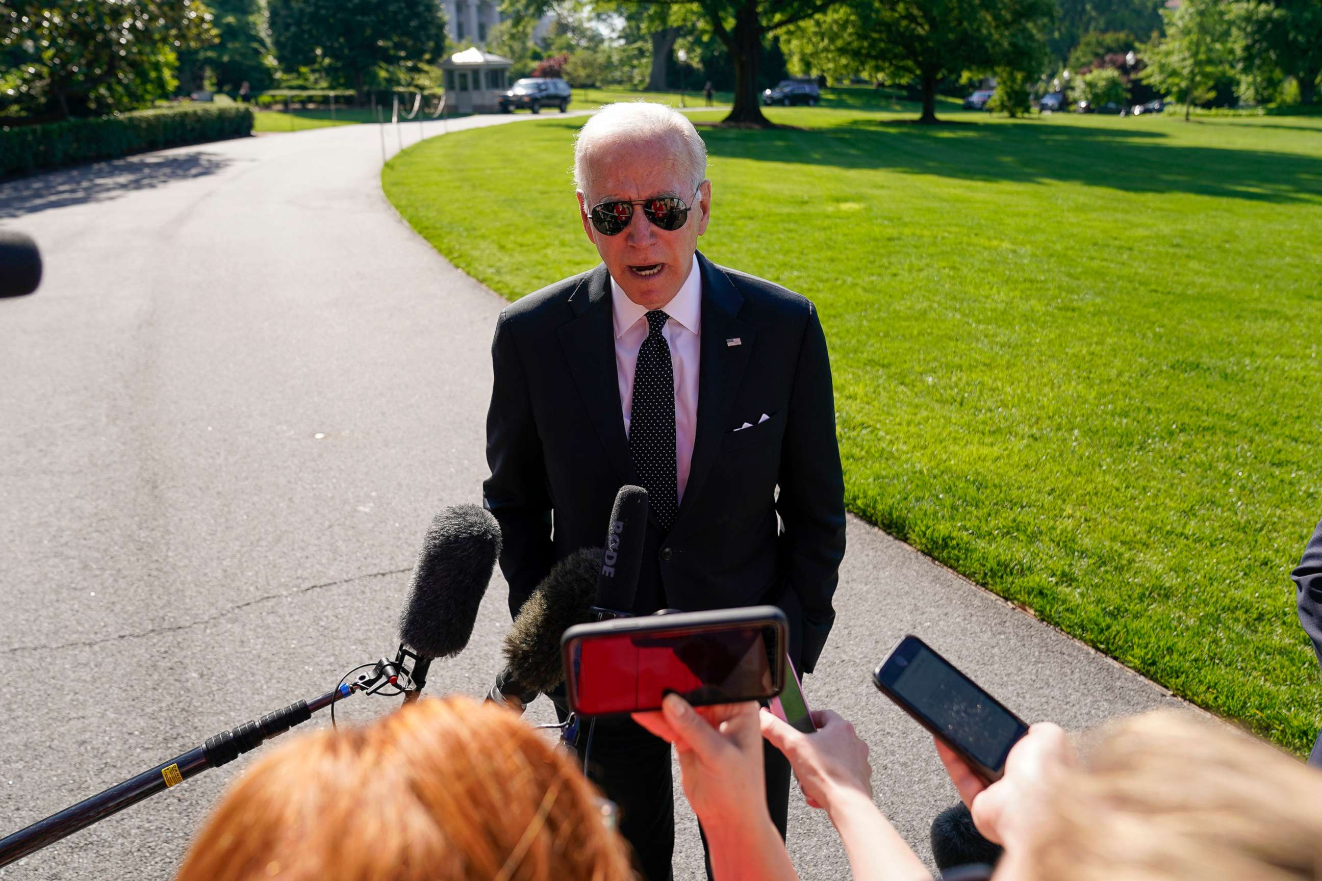 PHOTO: President Joe Biden speaks to reporters as he returns to the White House from Delaware on the South Lawn in Washington, D.C., May 30, 2022.