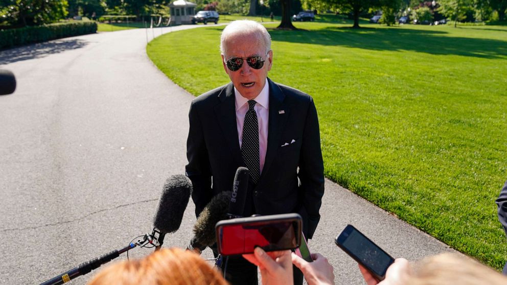 PHOTO: President Joe Biden speaks to reporters as he returns to the White House from Delaware on the South Lawn in Washington, D.C., May 30, 2022.