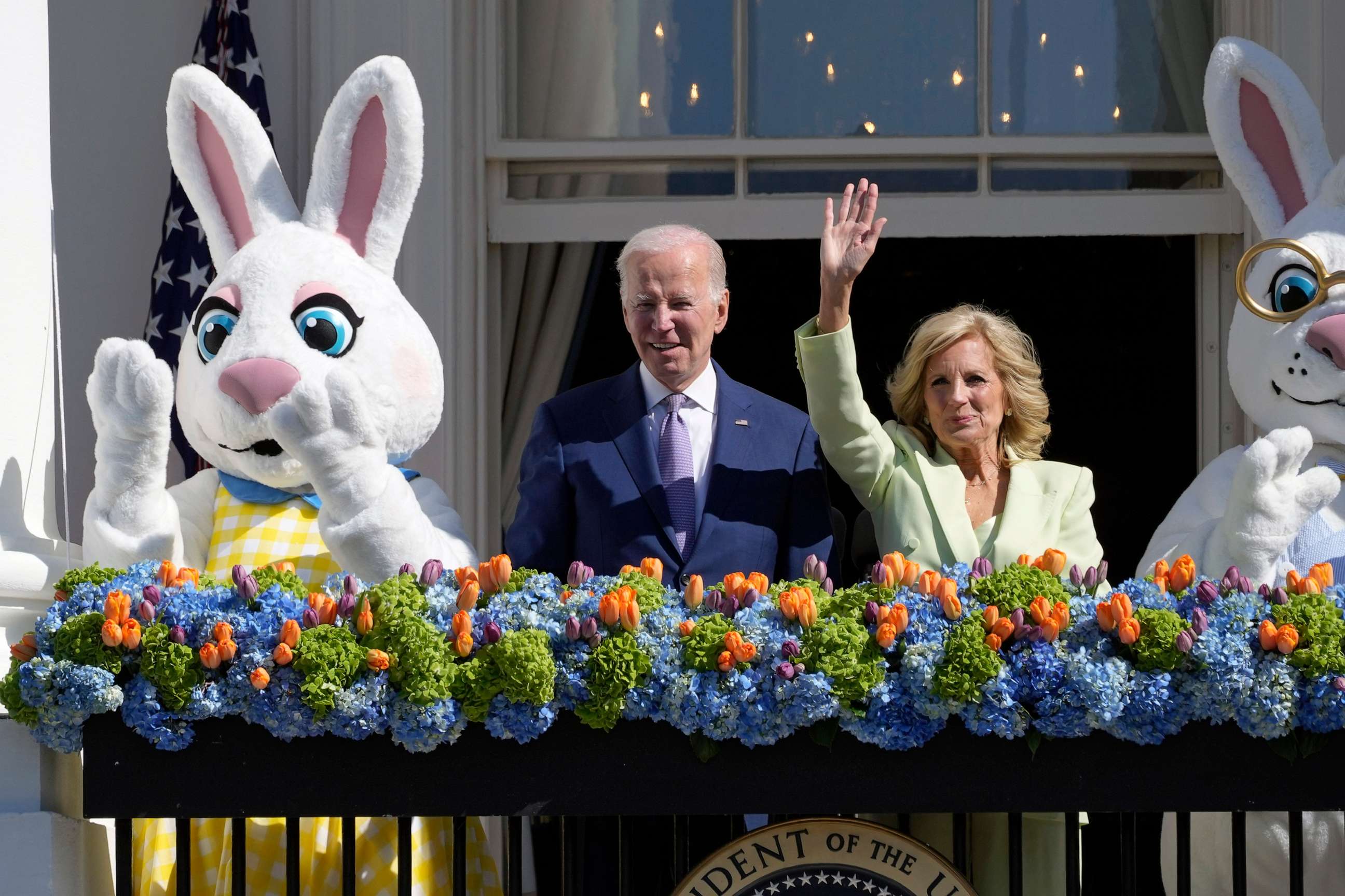 PHOTO: President Joe Biden and first lady Jill Biden stand on the Blue Room Balcony as they attend the 2023 White House Easter Egg Roll, April 10, 2023, in Washington.