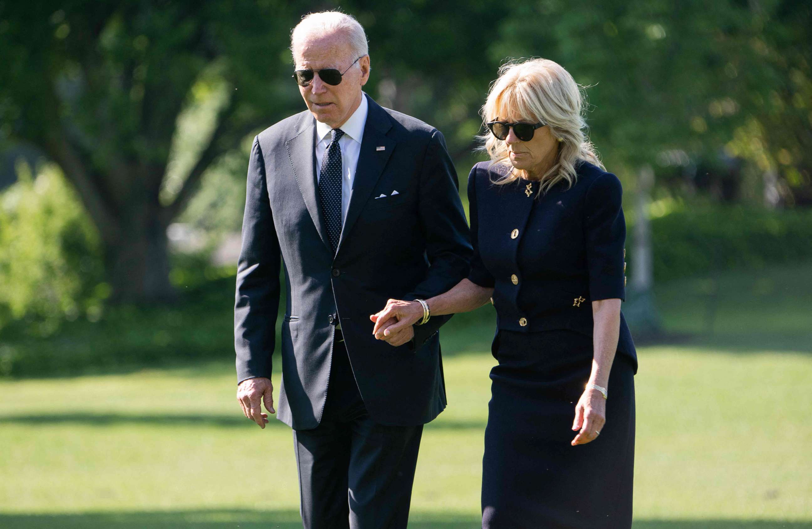 PHOTO: President Joe Biden and first lady Jill Biden walk on the South Lawn of the White House in Washington, D.C, May 30, 2022.