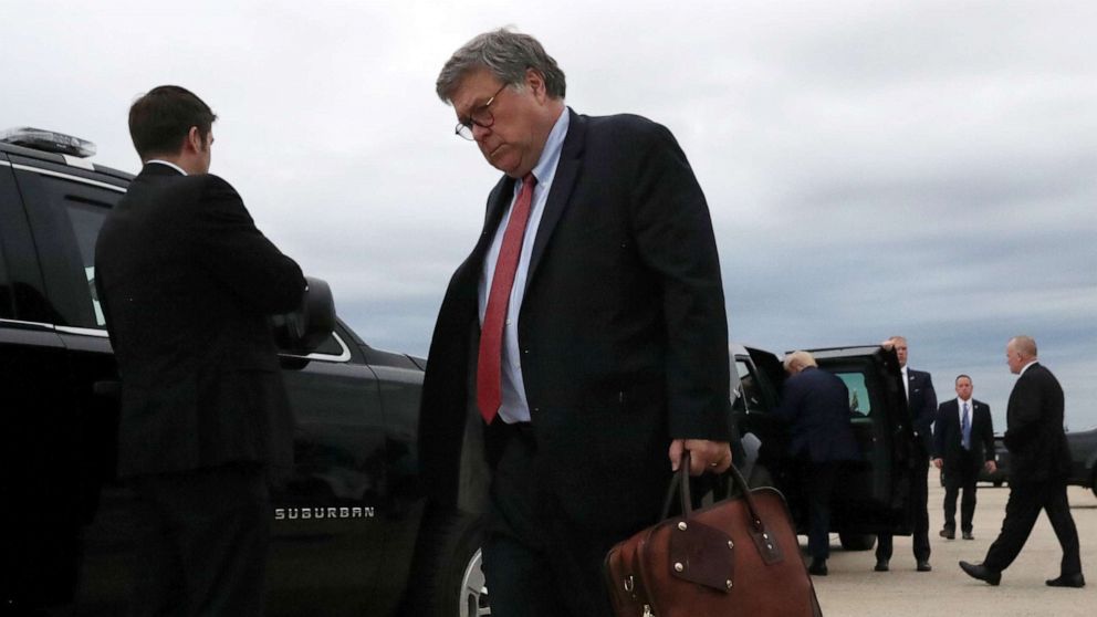 PHOTO: U.S. Attorney General Bill Barr and President Donald Trump walk to their cars  after landing at Joint Base Andrews, Maryland, Sept. 1, 2020.