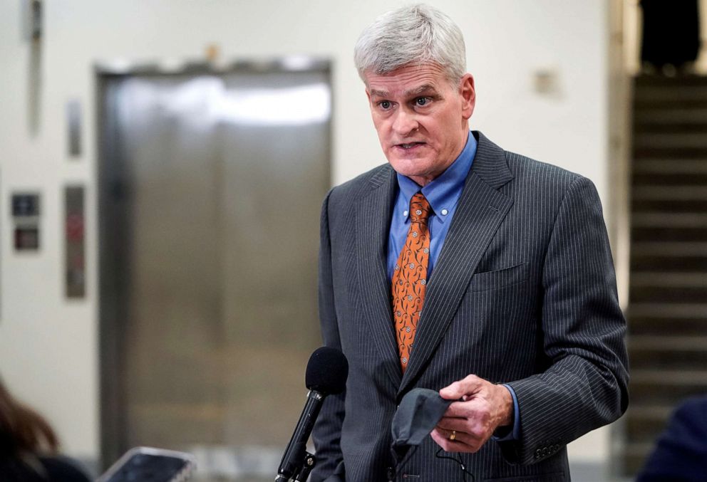 PHOTO: Senator Bill Cassidy speaks to the media as he departs after House impeachment managers rested their case in impeachment trial of former U.S. President Donald Trump, in Washington, D.C., Feb. 11, 2021. 