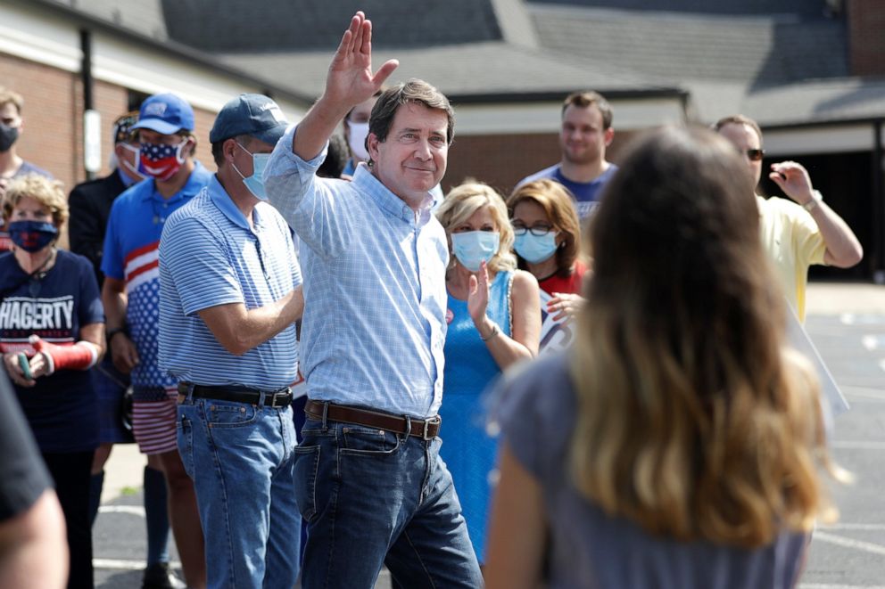 PHOTO: Former U.S. Ambassador to Japan Bill Hagerty waves to supporters at a polling place Thursday, Aug. 6, 2020, in Brentwood, Tenn.