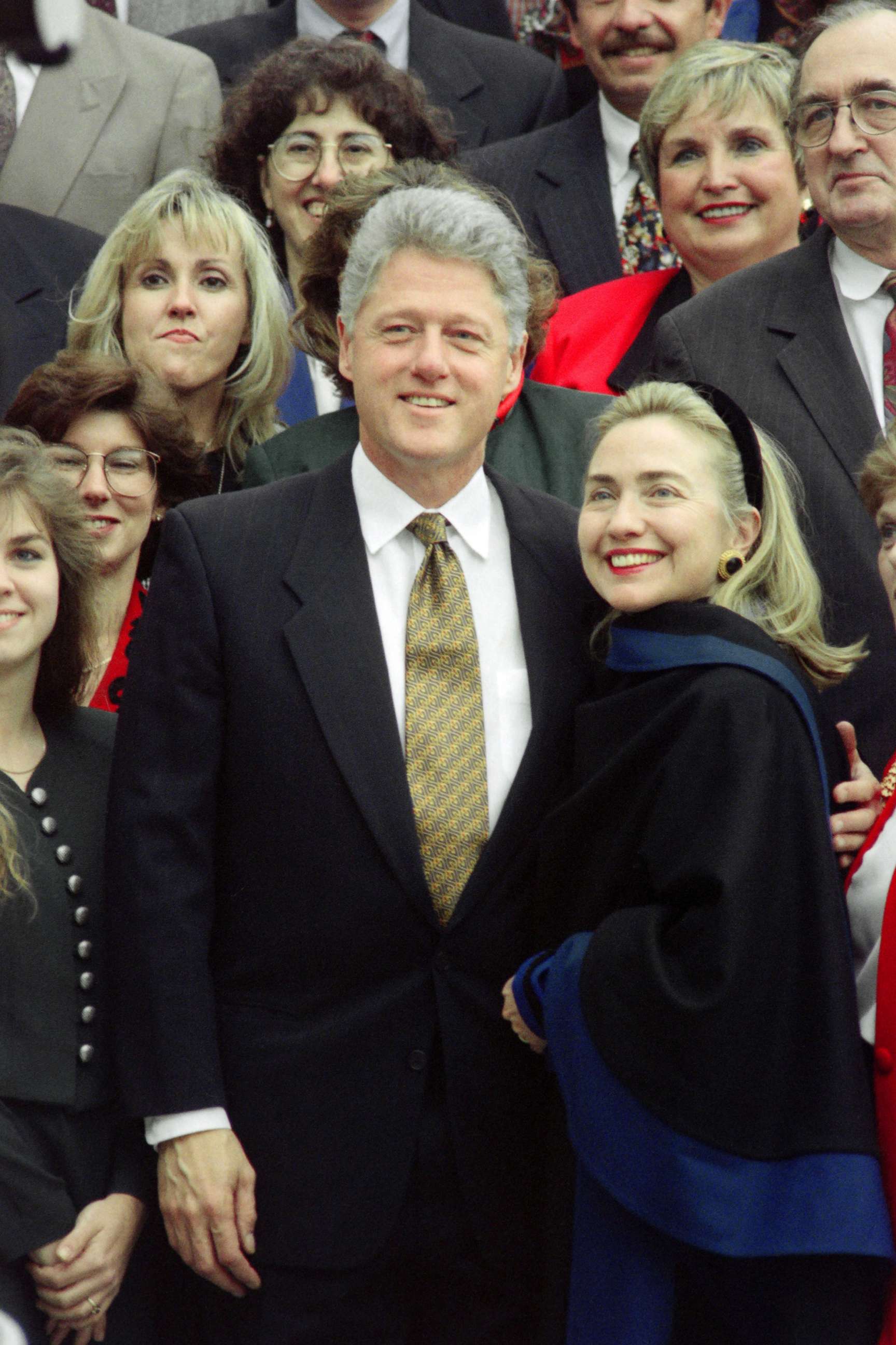 PHOTO: In this Dec. 3, 1995, file photo, President Bill Clinton and First Lady Hillary Clinton pose at the White House with some of the volunteers who decorated the White House for Christmas.