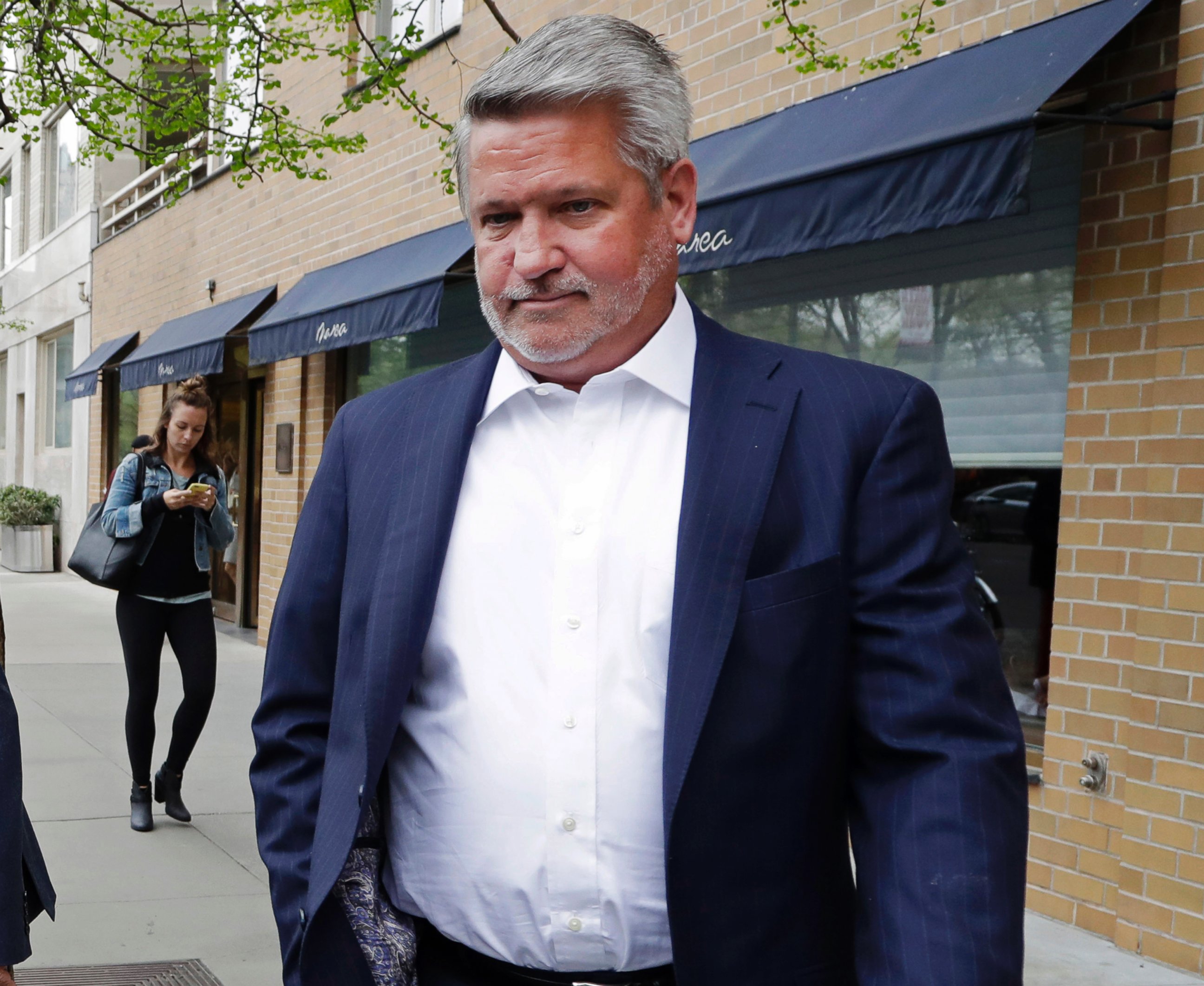 In this April 24, 2017, file photo, then-Fox News co-president Bill Shine, right, leaves a New York restaurant. President Donald Trump is expected to name Shine as director of White House press and communications.