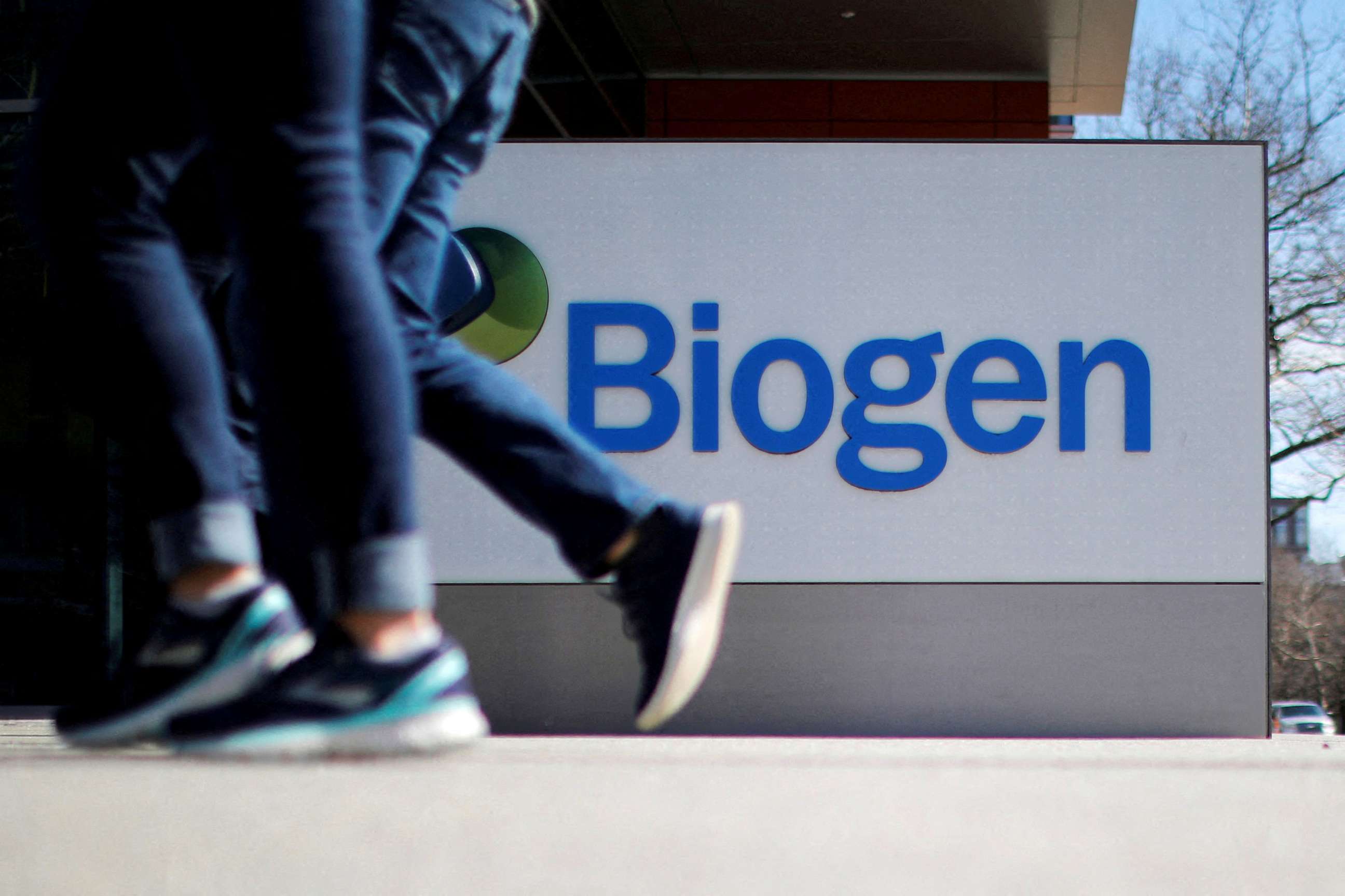 PHOTO: A sign marks a Biogen facility in Cambridge, Mass., March 9, 2020.