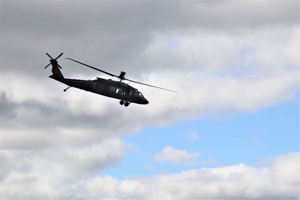 PHOTO: An aircrew flies a UH-60 Black Hawk helicopter over the cantonment area during training operations Sept. 6, 2019, at Fort McCoy, Wis.